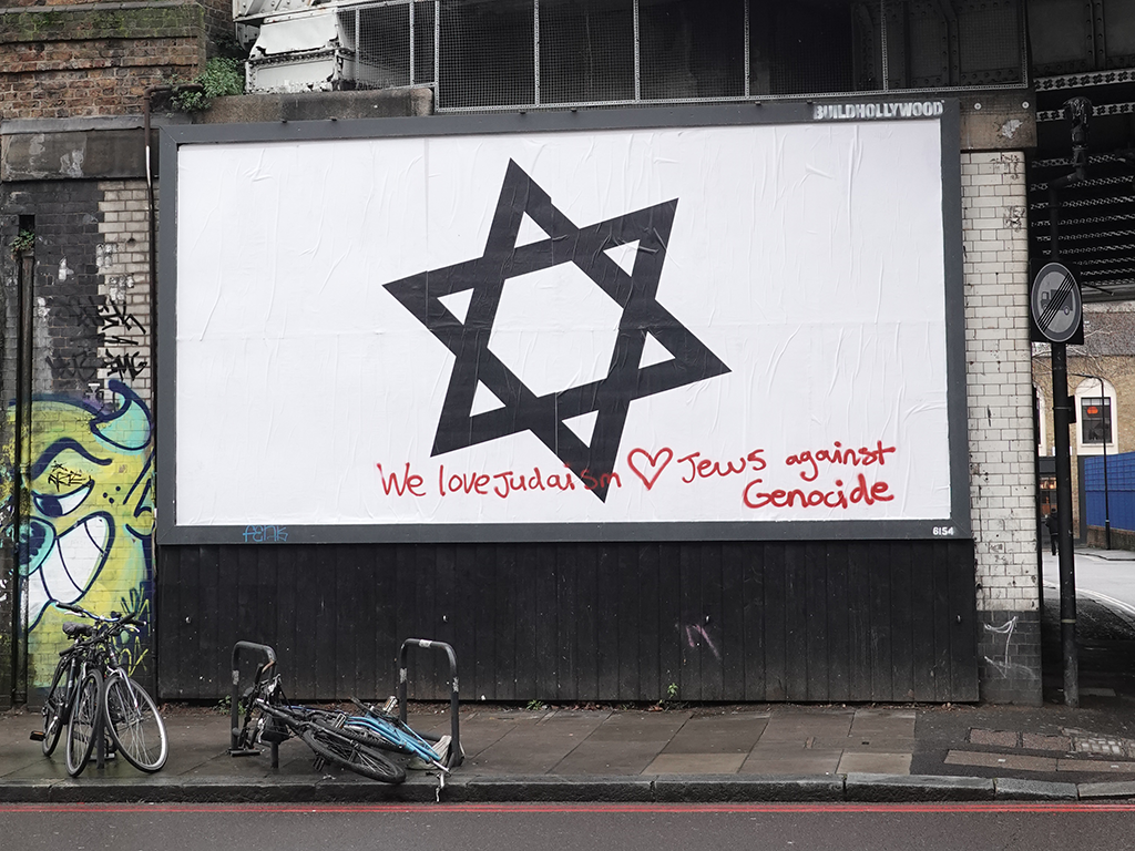 Billboard tagged with &ldquo;We love Judaism ❤ Jews against Genocide&rdquo;